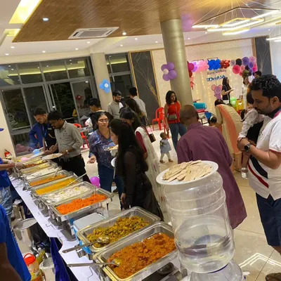 A glimpse of our buffet catering service at a birthday party. While the kids enjoy the themed decorations, guests can enjoy a wide spread of delicious food, all managed by our professional team.