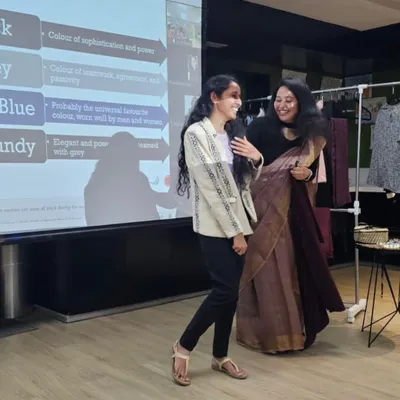 A moment of shared laughter and learning during a power dressing workshop. We were demonstrating how a simple blazer can elevate an outfit and boost confidence.