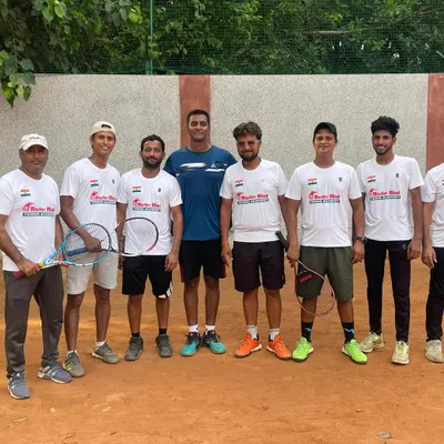 A group photo with the Mastermind Tennis Academy coaching team and players. We foster a strong sense of community and teamwork.