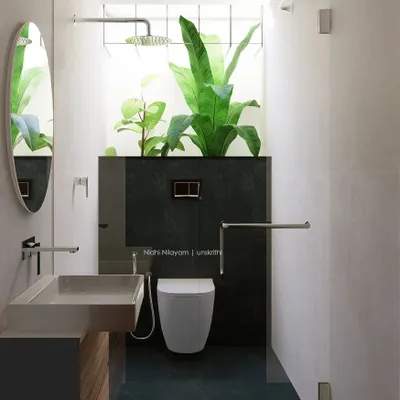 This bathroom connects you directly with nature. A large skylight floods the space with light, nourishing the indoor plants and creating a tranquil, open-air shower experience. It's a perfect example of minimal design for maximum calm.