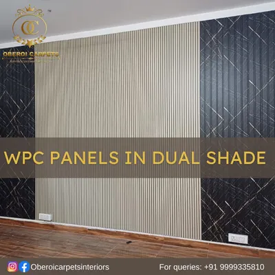 Create a stunning feature wall with our dual-shade WPC panels. Here, we combined a light wood-textured panel with a dark marble-effect panel for a high-contrast, modern look.