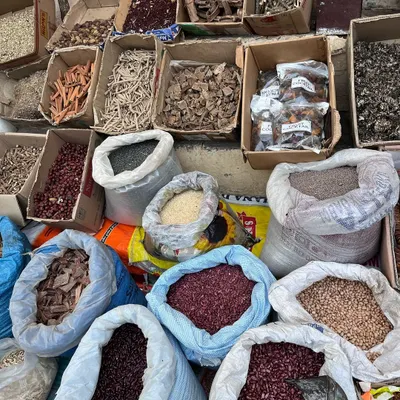 Here I am at a local market, carefully selecting dried herbs, roots, and seeds for my dye pots. Sourcing high-quality, authentic ingredients is the first step in creating beautiful and effective Ayurvastra textiles.