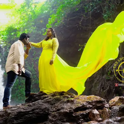 This vibrant yellow flying gown looks incredible against natural backdrops like this waterfall. The long trail adds a burst of color and movement to your pre-wedding or maternity photos.