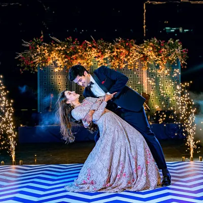 The perfect end to a first dance. We use dramatic elements like sparklers to create magical, high-impact photos of your Sangeet or reception.
