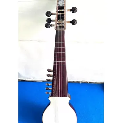 This is a Rabab, a lute-like instrument central to the music of Afghanistan, Pakistan, and parts of India. We source authentic Rababs for musicians seeking its distinctive, soulful sound.