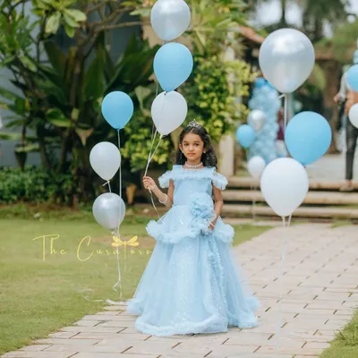 The birthday princess makes her grand entrance. We lined the pathway with balloons in her favorite colors, creating a magical walkway into her very own fairytale party.