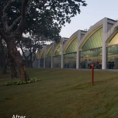This is the result of reimagining an old industrial shed in Okhla. We preserved the original arched structure and replaced solid walls with expansive glass, creating a seamless connection to the lush green landscape and transforming it into a modern, light-filled workspace.