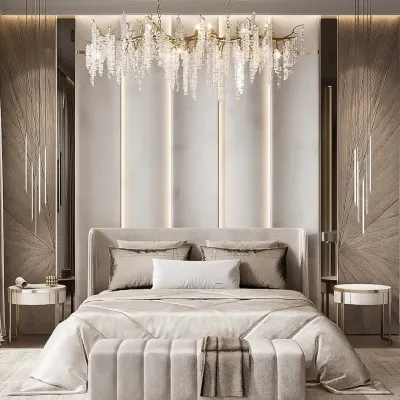 This suite embodies opulence with its dramatic crystal chandelier and textured, wood-paneled walls. We used a monochromatic palette and reflective surfaces to create a space that feels both glamorous and deeply restful.