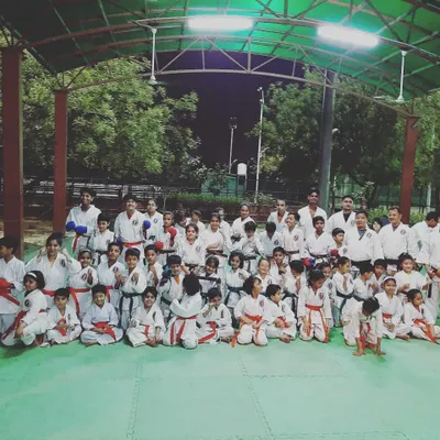 A group photo of my dedicated students and fellow instructors after a training session. We are a community committed to fitness, discipline, and mutual respect.