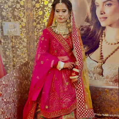 A full-length view of one of my stunning brides. I provided the complete package, including the HD bridal makeup, the elaborate hair updo, and jewellery setting.