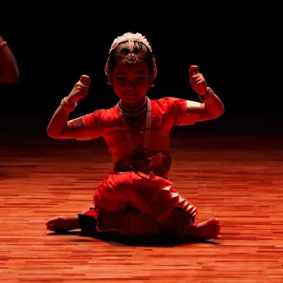 Even my youngest students learn the power of Abhinaya. Here, a little dancer sits in the Aramandi posture, her expression full of confidence and character.