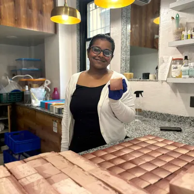 Here I am in our studio with a fresh batch of soap. It's always a proud moment to see a counter full of our handmade creations, ready to be cured and sent to their new homes.