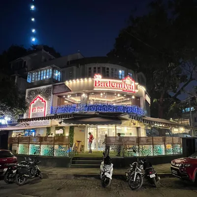 Our Bandra outlet, beautifully lit up at night. It offers a royal and cozy vibe, perfect for family dinners and get togethers.