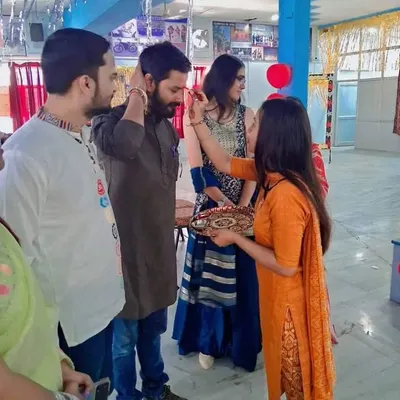 A student performs a traditional welcome ceremony with a tilak. We honor these cultural rituals as they create a sense of respect and sanctity for the journey we are about to undertake together.
