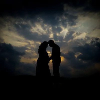 There is nothing more beautiful than a sunset sky. I love creating these silhouette portraits for couples during outdoor maternity sessions, capturing their connection in a dramatic and natural setting.