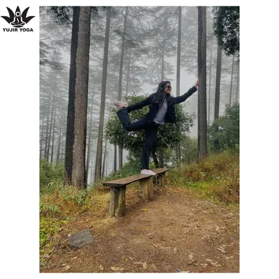 Practicing Natarajasana, the dancer's pose, in the middle of a forest. The natural, uneven surface adds an extra challenge to my balance and helps me feel grounded.