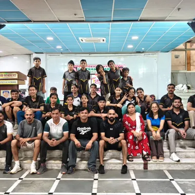 A group photo of our summer camp students and coaches. This picture captures the incredible energy and spirit of our Dynamo Fencing Club family.