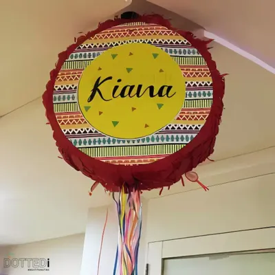 A custom-made piñata for Kiana's party, ready to be filled with candy and surprises. I can personalize these for any name, theme, or occasion.