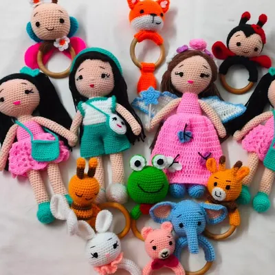 Here is a happy family of my handmade crochet toys. I have dolls and many animal rattles like frogs, bunnies, and elephants. It makes me so happy to see them all together before they go to their new homes.