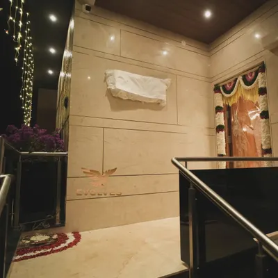 The entrance to a house warming event we decorated. We use a combination of traditional floral arrangements and modern lighting to create a warm and inviting atmosphere.