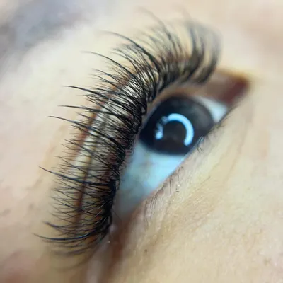 This detailed macro shot highlights the precision of my lash application. Each extension is placed one by one to ensure a seamless blend with your natural lashes for a flawless, high-definition finish.