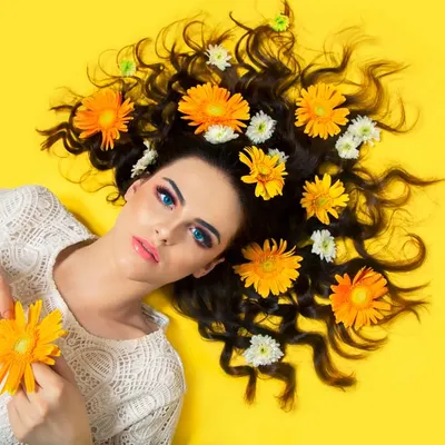 This beauty portrait highlights the effectiveness of the studio's vibrant yellow wall. It creates a striking, saturated background that is perfect for fashion and editorial work, requiring minimal post-production to look great.