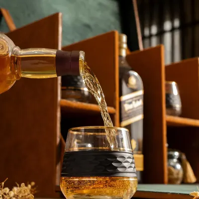 The perfect pour. Our luxury whiskey hamper is an experience, featuring premium whiskey, crystal glasses, and gourmet nuts, making it an ideal gift for any aficionado.