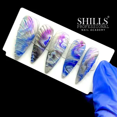 A stunning marble ink design with a textured, wet-look finish created using silver gel lines over a blue, purple, and grey marbled base.