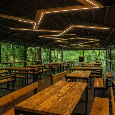 Our dining hall is designed to keep you connected with nature, with open walls that look out into the forest. It's the perfect setting to enjoy our buffet.