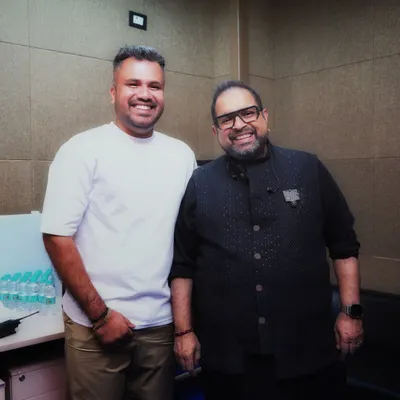 A backstage moment with the one and only Shankar Mahadevan. I've had the privilege of being part of events featuring legendary artists, reflecting my standing in the professional music industry.