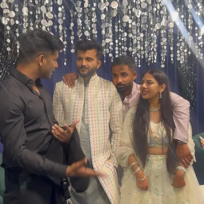 A quick chat with a happy couple and their family after a successful Sangeet night. Building a great relationship with my clients is key to a successful event.