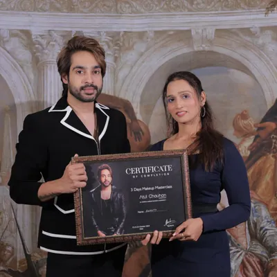 A proud moment, awarding a certificate of completion to a talented student after our 3-day makeup masterclass.