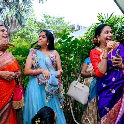 Capturing the candid laughter and joy of family members at an Upanayanam (thread ceremony). My event photography is about documenting these real, unposed moments.