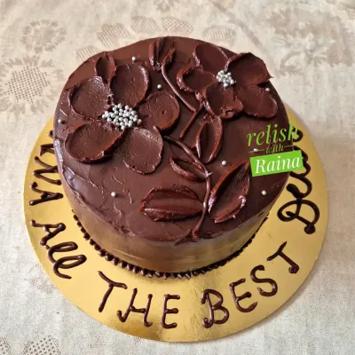This eggless Chocolate Truffle Cake was a custom order. I used a palette knife to create the chocolate flower design on top, adding a personal artistic touch to the rich cake.