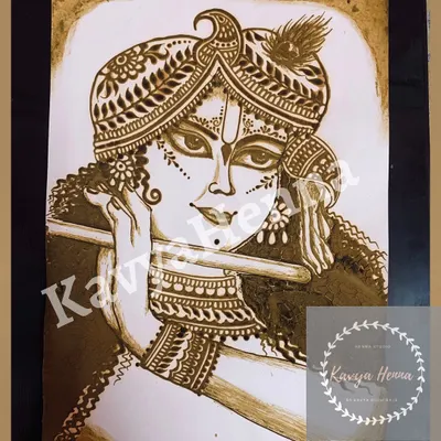 A custom henna portrait of Krishna, created with fine lines and shading for Janamashtami. This devotional art piece is drawn on paper using natural henna paste, showcasing the level of detail possible in my work.