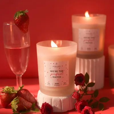 A candle appeals to the soul, not just the eyes. My 'We're the Perfect Match' candle, with its romantic scent and frosted glass, is designed to create a beautiful ambiance for a special date night.