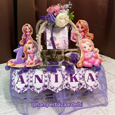 A beautiful, fully customized Rapunzel-themed hamper for Anika's first birthday, showcasing our ability to work with any character theme.