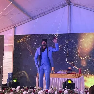 On stage during a property launch for MJR Builders. I combine my hosting duties with a magic performance to make the launch event more dynamic and memorable for potential buyers.