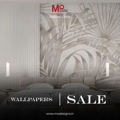 An example of how our wallpapers can transform a bedroom. This design features a large, calming palm leaf motif, creating a serene and sophisticated accent wall.