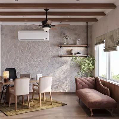This study room embraces a rustic, earthy aesthetic with quiet elegance. A standout stone feature wall adds grounding texture, while the clean lines of the desk and a plush chaise lounge make it a serene escape to think, work, and create.