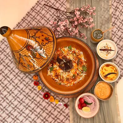 My Kashmiri Kesar Gucchi Pulao is a dish for special occasions. It features rare Gucchi mushrooms (wild morels) from the Himalayas, cooked with saffron-infused rice and served with rich saalan and truffle burani raita.