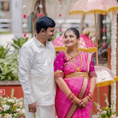 A close-up, candid photo of the couple sharing a look of love during their baby shower. These are the simple, heartfelt moments I strive to capture amidst the day's celebrations.