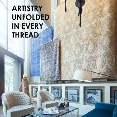 For the Hands Carpets showroom, our goal was to elevate the carpet to the stature of art. The double-height 'showstopper' display immediately captures attention, presenting the carpets as grand tapestries in a gallery-like setting.