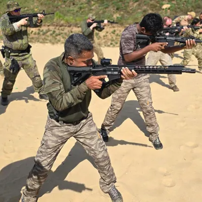 Our military instructors engage in live-fire tactical drills in Poland. This level of international training ensures we teach the most effective and modern rifle handling and combat shooting techniques.