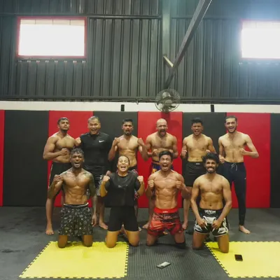 This is Team Ace MMA after a tough sparring session. We push each other hard, and we stand together as a team. This picture captures the grit, respect, and camaraderie that defines our gym.