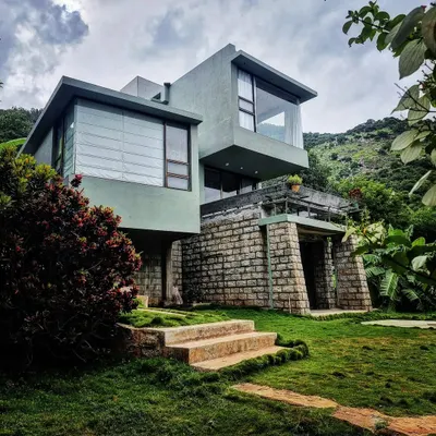 An earlier project from 2011, the Bali House at the Nandi foothills was an exploration in creating a home on a challenging slope. The design uses cantilevered forms and large glass walls to create a feeling of hovering within the lush, tropical landscape.