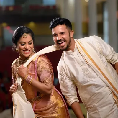 A fun, candid moment between the bride and groom during their wedding festivities. Capturing these playful, unscripted interactions is what makes wedding photography so special to me.