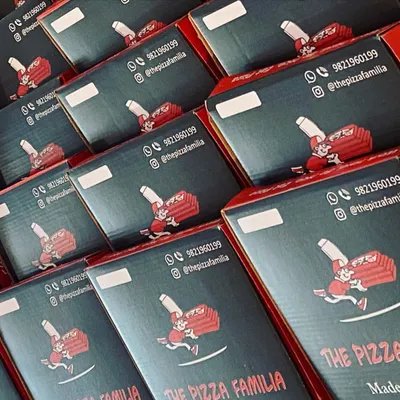 Our branded pizza boxes are ready to go. This professional packaging not only looks great but also keeps your pizza hot and fresh, reflecting our commitment to quality at every step.