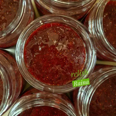 A close-up of my homemade Strawberry Jam. I make this when strawberries are in full season, using only fresh, red, and juicy fruit. It has no artificial colours, flavours, preservatives, or pectin, just pure fruit goodness.