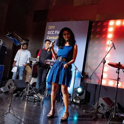 On stage with the full band at an IBM corporate event. I love performing for corporate gigs, bringing a mix of Bollywood and pop music to create an engaging and fun atmosphere.